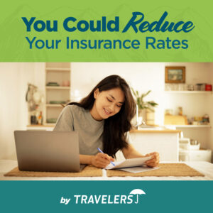 Woman at desk reducing insurance rate with Travelers